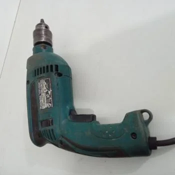 Foto 3 de Taladro Marca Makita Modelo Hp1640 Usado Con Desgaste Acc Sin Llave Mandril