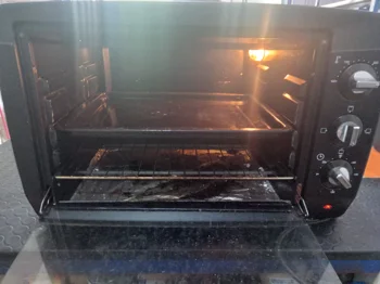 Foto 2 de Horno Marca Tokyo Litros 45 Modelo Edtherlisto-N Usado En Buen Estado Acc Parrilla Bandeja