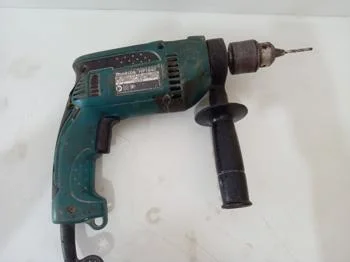 Foto 2 de Taladro Marca Makita Modelo Hp1640 Usado En Buen Estado Acc MangoMecha