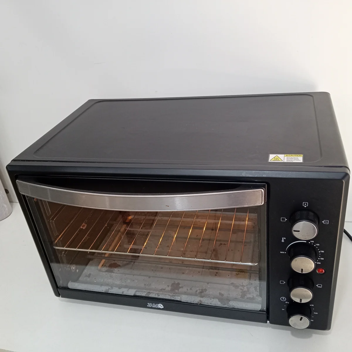 Foto 2 de Horno Marca Jam Litros 42 Modelo Dn42e-Rml Usado En Buen Estado Acc Con Parrila