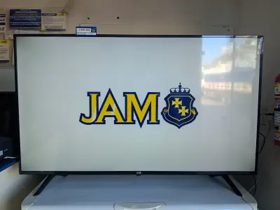 Televisor Led Smart De 55 '' Marca Jam Modelo Sk55u20 Con Control Usado En Buen Estado Acc Par De Patitas De PedestalCable Corriente