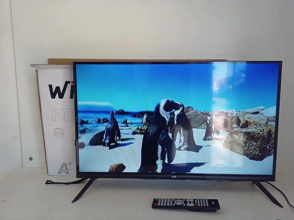 Foto 2 de Televisor Led Convencional De 32 '' Marca Win Modelo Win32fn Usado En Buen Estado Con Control Con Caja Acc Par De Patitas De Pedestal