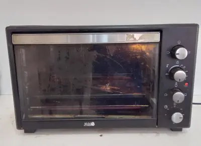 Horno Marca Jam Litros : 42 Modelo Dn42e-Rml Usado Con Desgaste Acc: Con Bandeja Y ParrillaSoporte Para Spiedo Comentario: Con Grasa Y U Poco De Suciedad