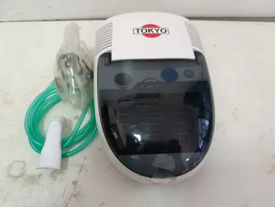 Nebulizador Marca Tokyo Modelo Edtnfreshair Usado En Buen Estado Acc: Manguerita2 MascarillasRecipiente Para MedicamentoEn Caja Estropeada Comentario: A Piston