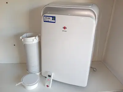 Aire Acondicionado Tipo Portatil Marca Tokyo Modelo Aatoportm12k Potencia Btu 12 Con Control Usado Con Desgaste Acc Caño Corrugado Para Salida De Aire Caliente