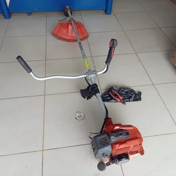 Desmalezadora Marca Husqvarna Modelo 131r Usado Con Desgaste Original Si Acc Cabezal C/ NylonCuchilla Tuerca Y ArandelaCinta Para Colgar