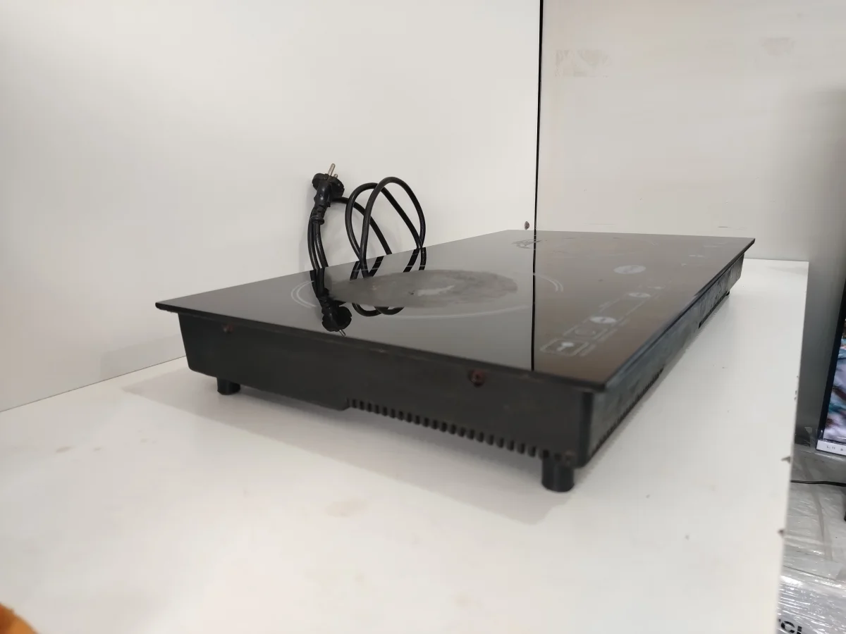 Foto 2 de Cocina Electrica Tipo Inducción Marca Midas Modelo Md-Pi35 Usado En Buen Estado Acc No Tiene