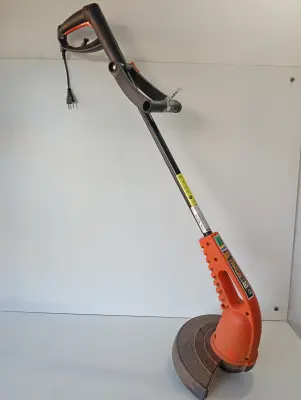 Bordeadora De Cesped Marca Tramontina Modelo Ap1000t Usado En Buen Estado Acc: Protector