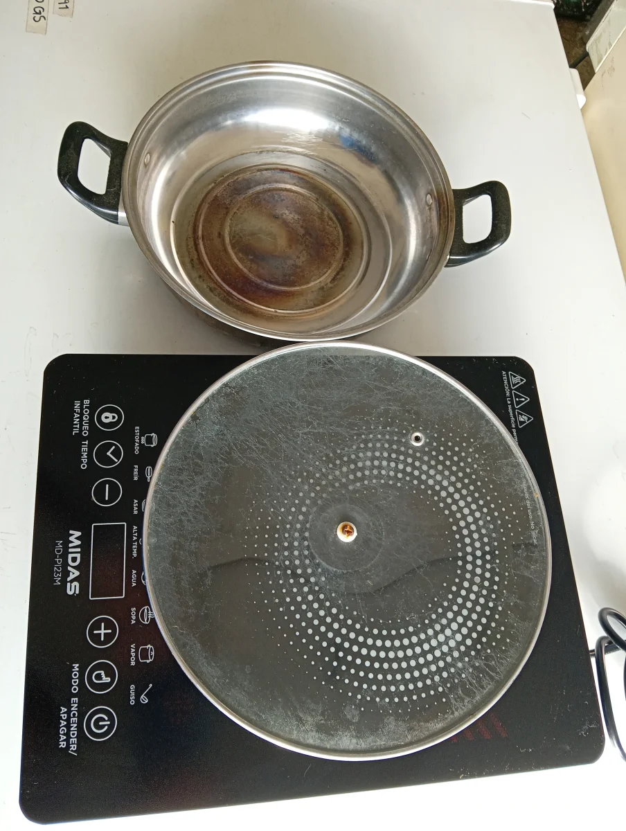 Foto 2 de Cocina Electrica Tipo Inducción Marca Midas Modelo No Tiene Usado En Buen Estado Acc Olla InoxTapa De Vidrio