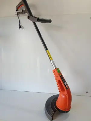 Bordeadora De Cesped Marca Tramontina 1500w Modelo Ap1500t Usado En Buen Estado Acc: ManijaProtectorCabezal