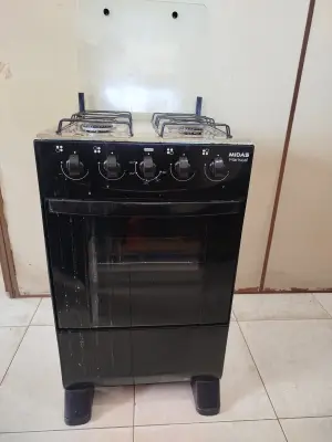 Cocina A Gas Marca Midas Modelo Mariscal Ng Usado En Buen Estado Acc Cuatro Hornallas Con AccesoriosParrilla En El Horno Cinco Perillas