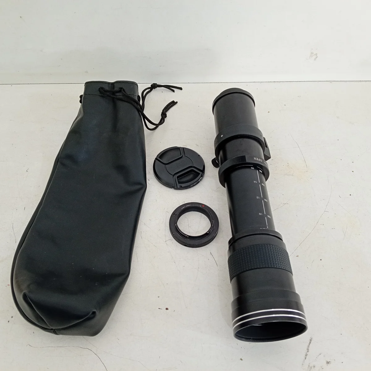 Foto 3 de Lente Para Camara Profesional Marca Sin Modelo Super Telephoto Usado En Buen Estado Con No Tiene Acc EstuchoTapa