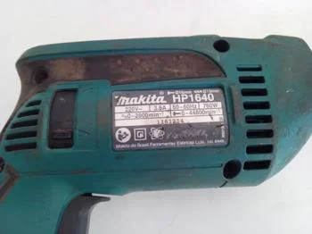 Foto 2 de Taladro Marca Makita Modelo Hp1640 Usado Con Desgaste Acc No Tiene