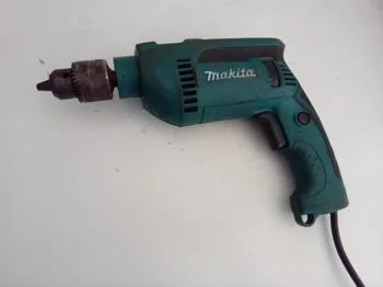 Foto 3 de Taladro Marca Makita Modelo Hp1640 Usado Con Desgaste Acc No Tiene