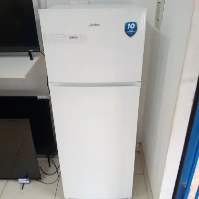 Heladera Marca Midas Modelo Mdrt294fgg01 Usado En Buen Estado Litros 300 Acc Una Parrilla En El CongeladorAbajo Con 3 ParrilasVerdulera3 Porta Vasos
