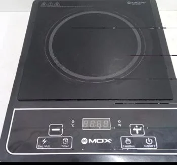 Foto 2 de Cocina Electrica Tipo Vitroceramica Marca Mox Modelo Mo-Kic09 Usado Con Desgaste Acc La Placa Esta Con Detalles De Manchas